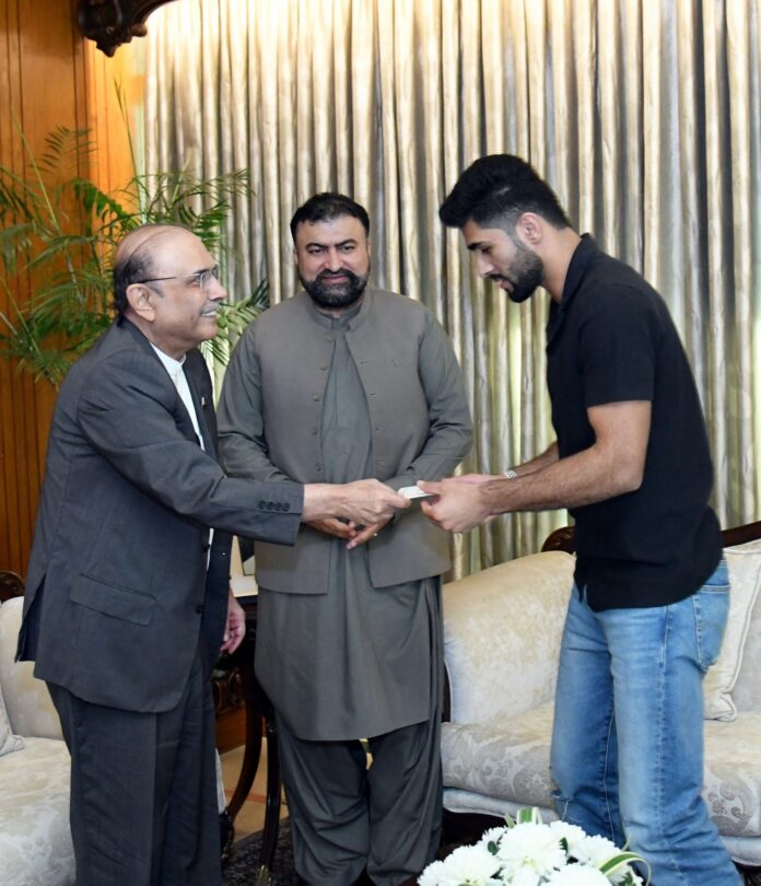 President felicitates Shahzaib Khan on winning World Karate Combat Championship; presents 100mn cheque