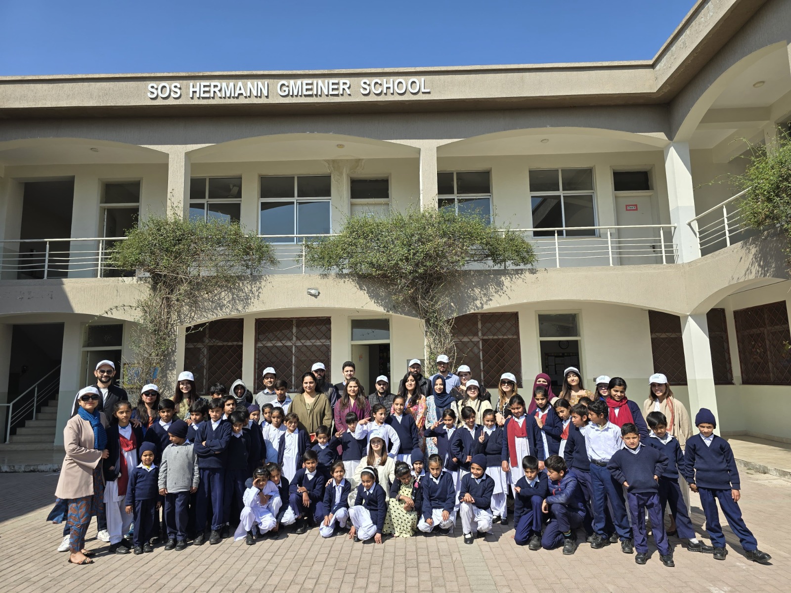 Volunteer Telenor employees visit SOS village